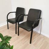 Set of 2 vintage office chairs in black leather chrome base plastic armrests / retro 1980s room
