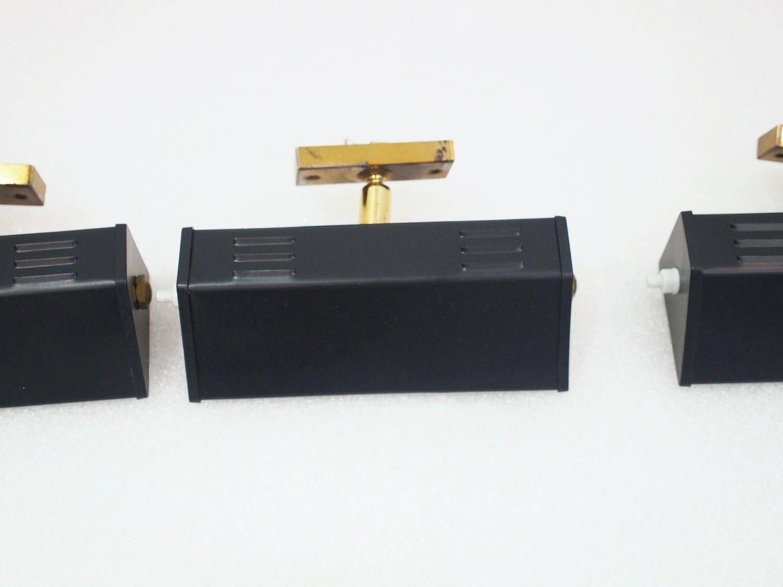 Six Italian wall sconces in brass and metal from the mid-20th century.