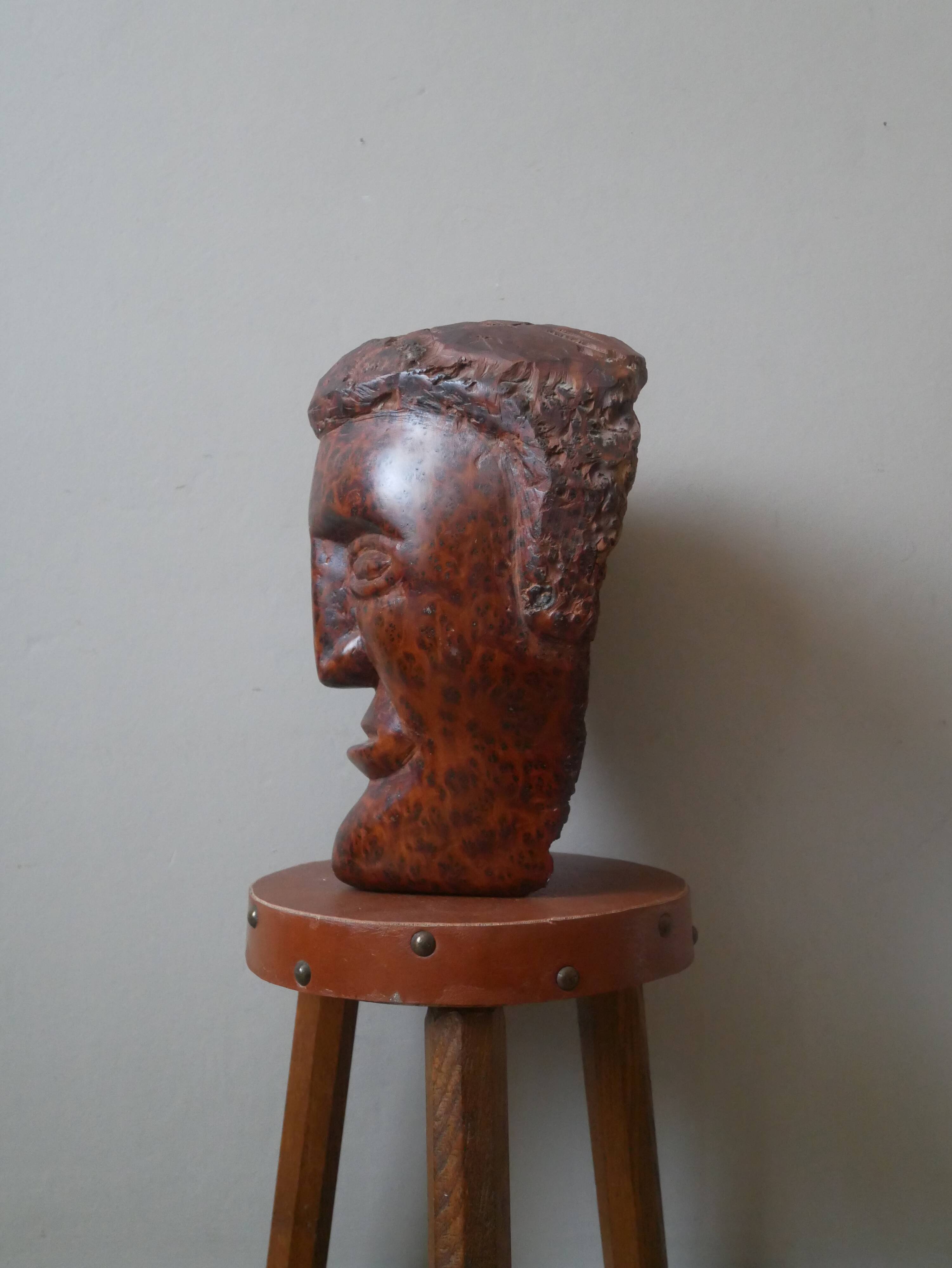 Wooden sculpture ethnic man's head handcrafted tribal decorative object workshop