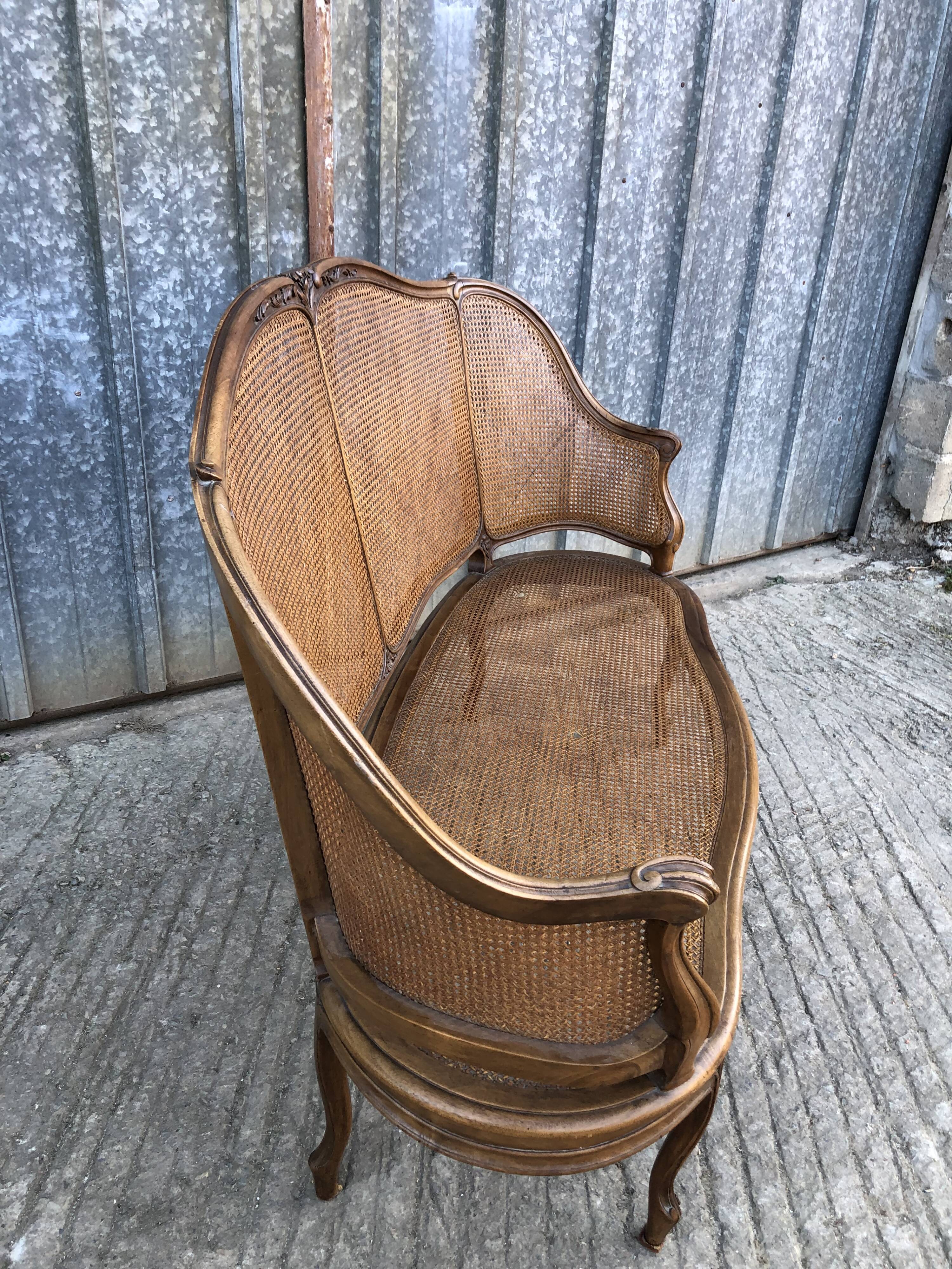 Antique Louis XV bench in solid walnut and caning