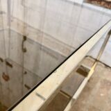 Square brass coffee table and smoked glasses