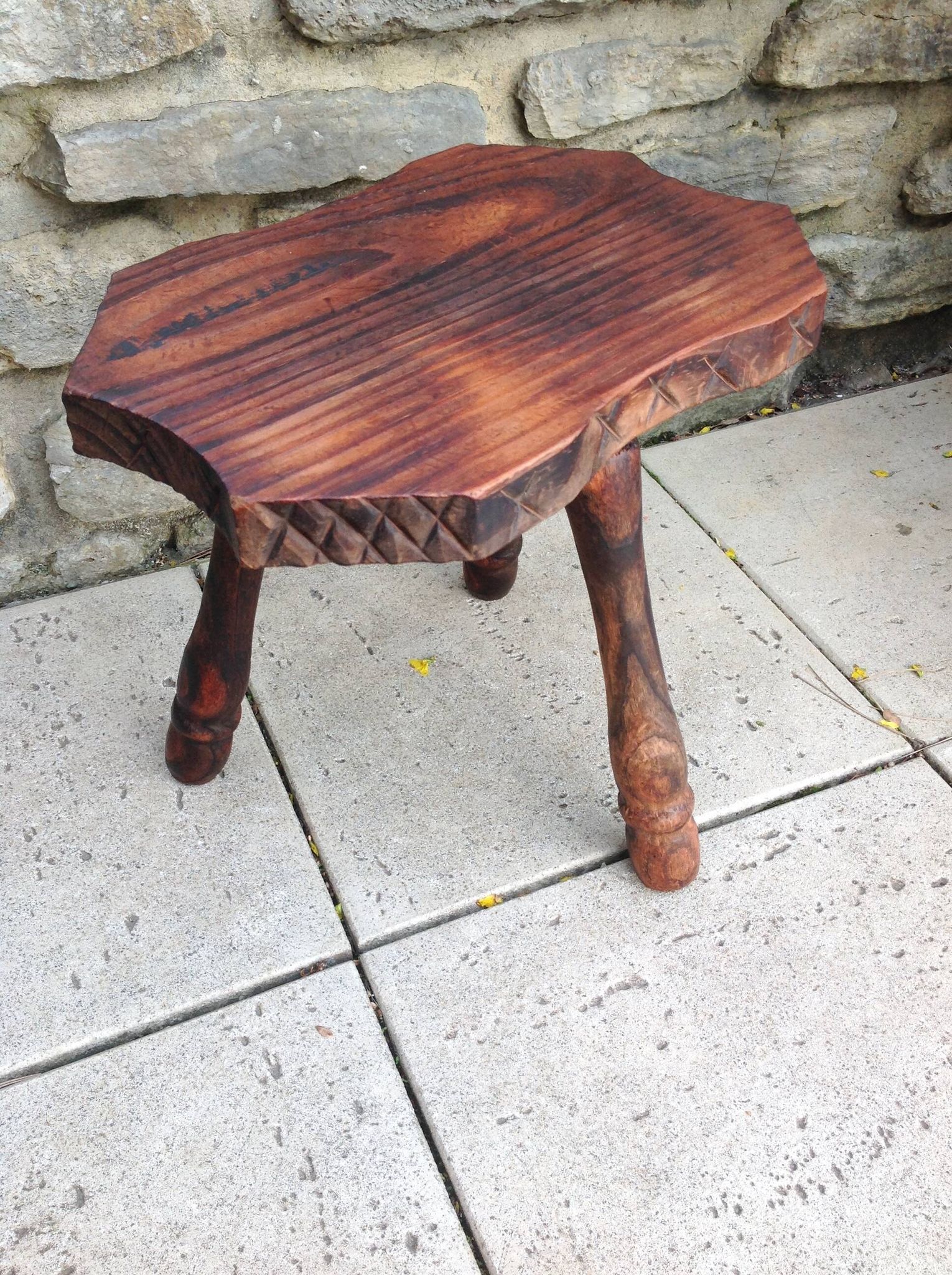 Vintage brutalist wooden tripod stool from the 60s and 70s