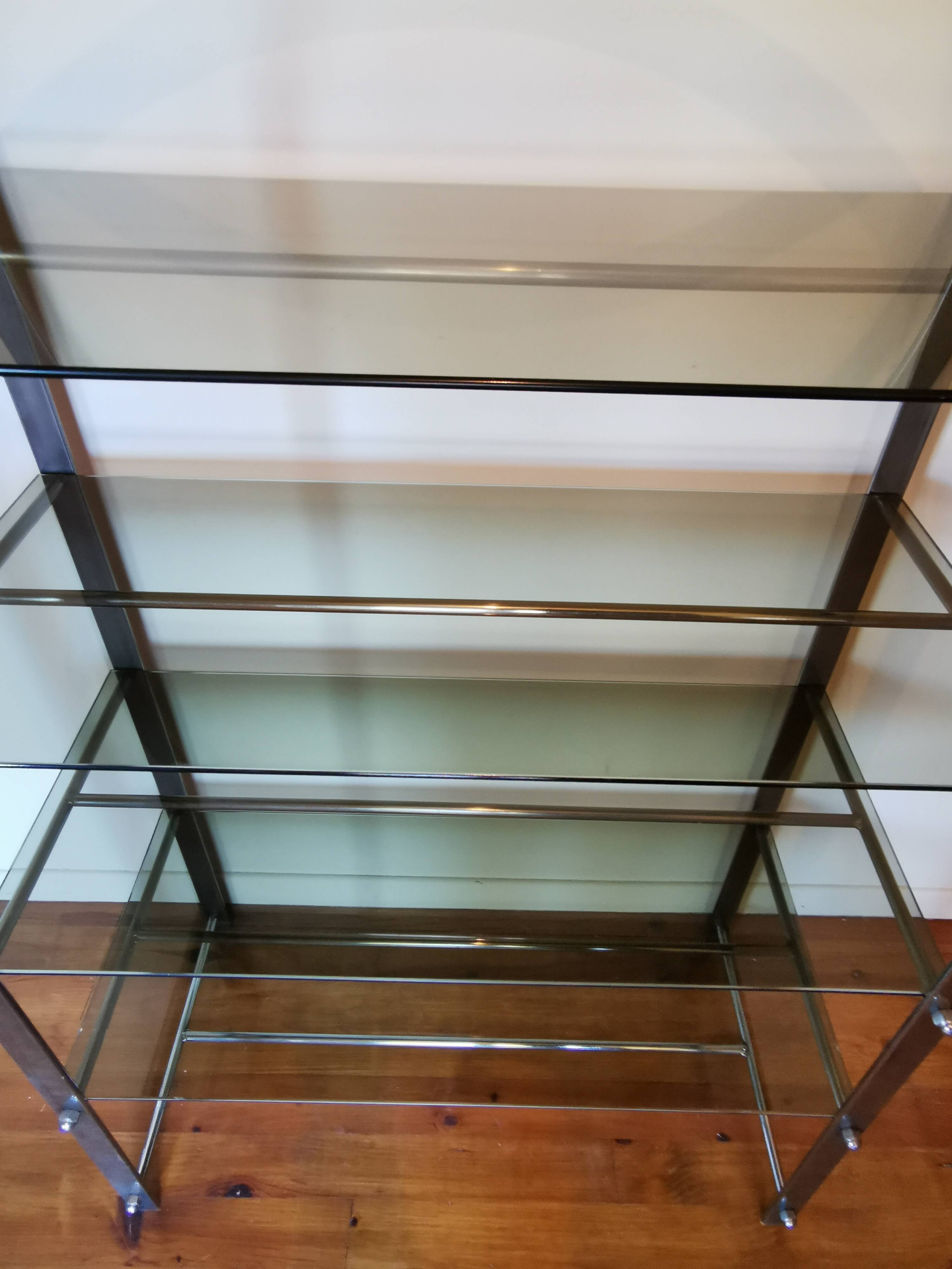 Rounded shelf from the 70s in chrome metal and glass