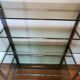 Rounded shelf from the 70s in chrome metal and glass