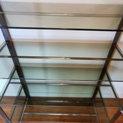 Rounded shelf from the 70s in chrome metal and glass