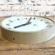 Beige industrial bakelite wall clock from Pragotron, 1970s