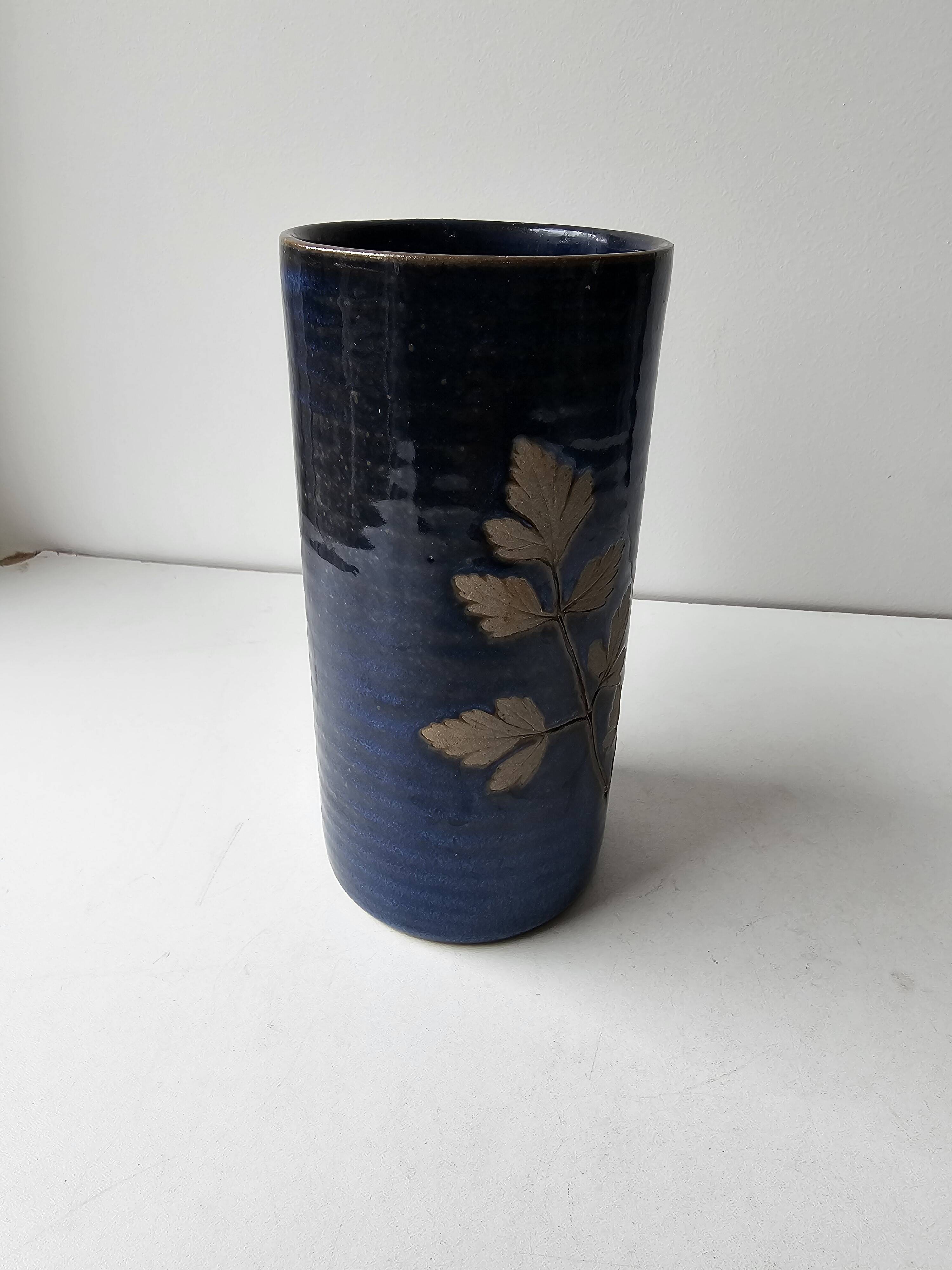 Blue ceramic vase with roller signed AB (signature to be identified)