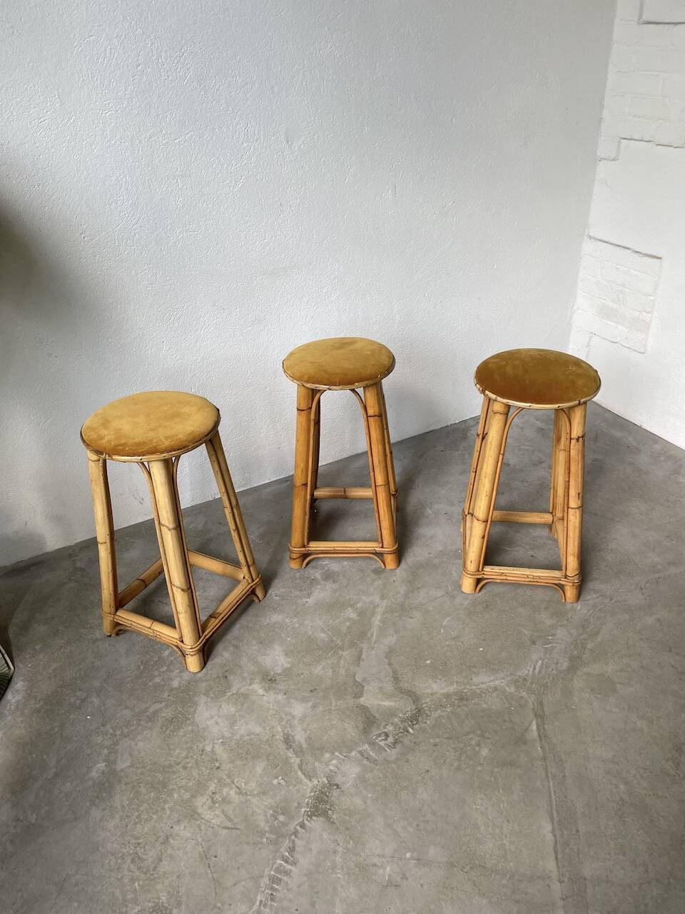 Set of three rattan high stools