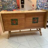 Rattan sideboard with ceramics
