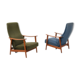 Pair of mid century Danish reclining lounge chairs in teak