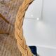 Vintage woven wicker mirror from the 70s