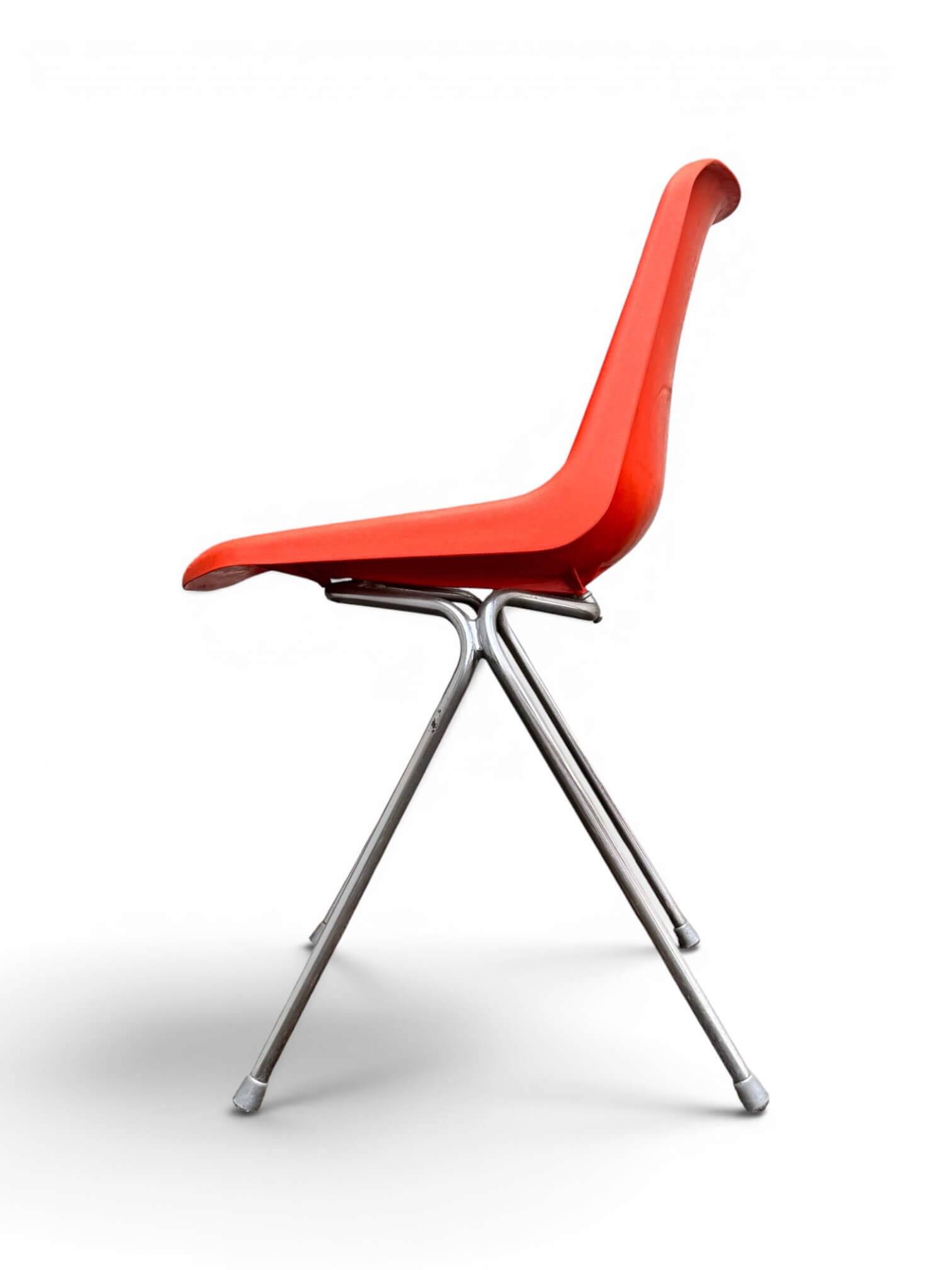 Set of 4 orange chairs designed by Robin Day for Hille.