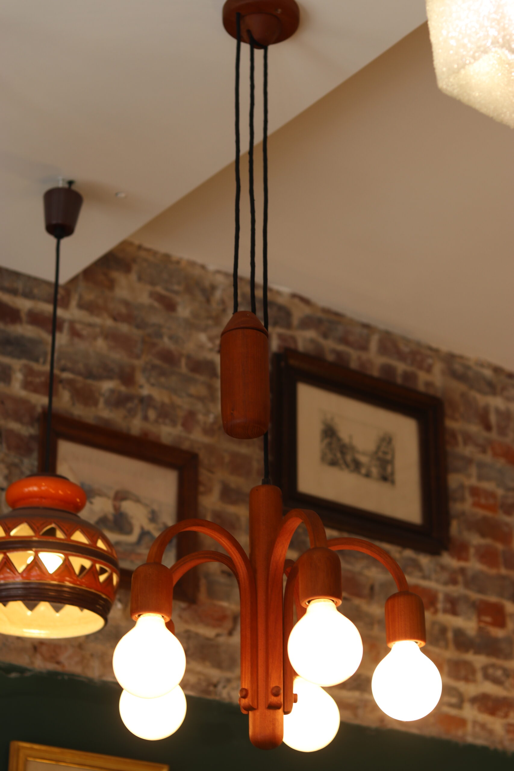 Danish pendant light Domus with counterweight in teak from the 1960s.