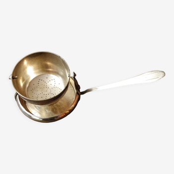 Silver metal tea strainer