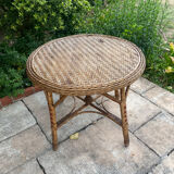 Round table with 2 rattan chairs