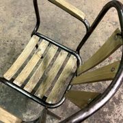 Industrial armchair in metal and wood
