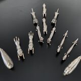 12 knife holders form various metal animals