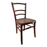 Wooden chair with cane seat, country style, around 1920
