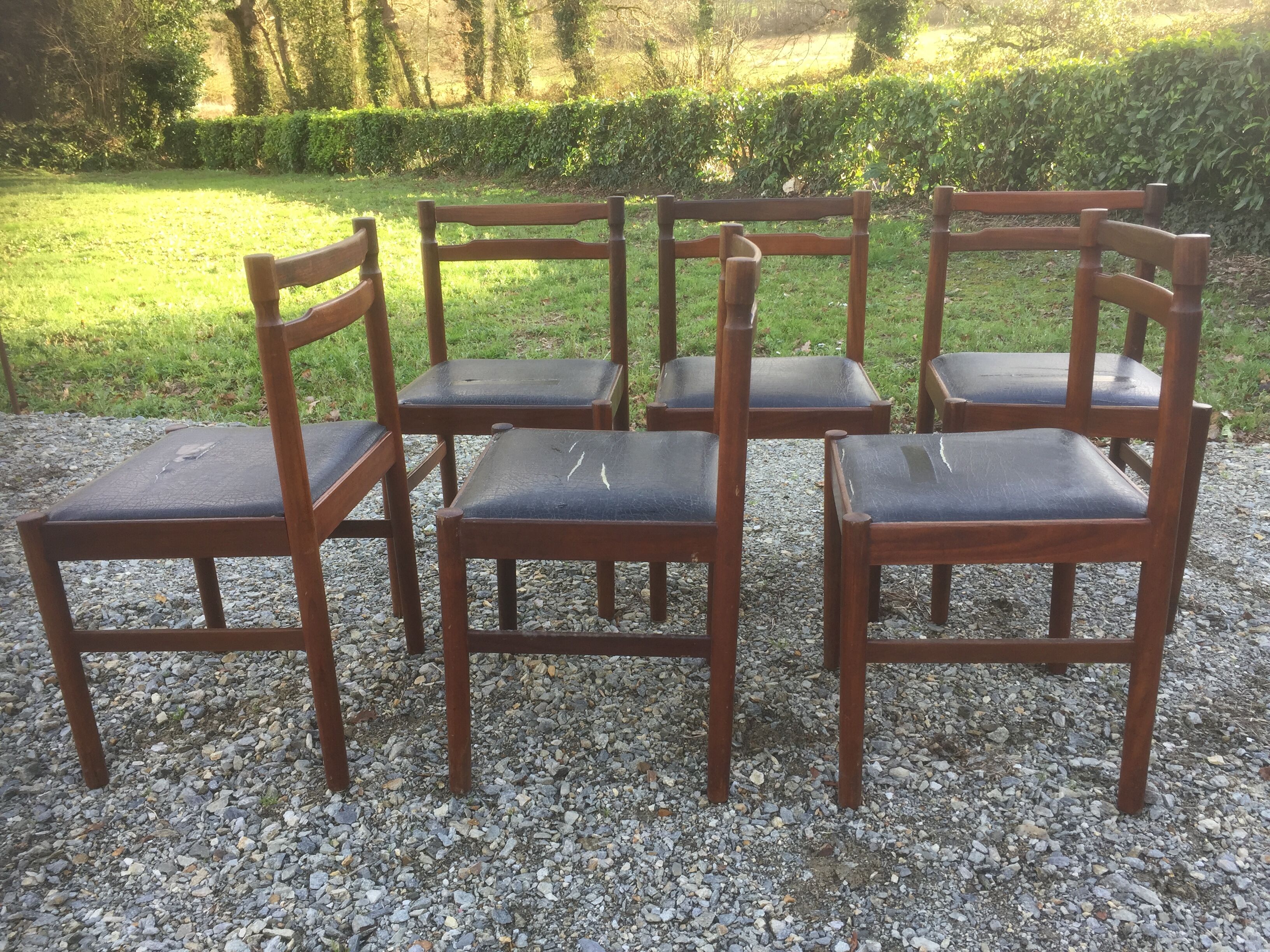 Vintage scandinavian teak chairs, black skaï seats as it is