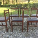 Vintage scandinavian teak chairs, black skaï seats as it is