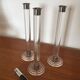 Serie of three candlesticks in Plexiglas and metal 1970