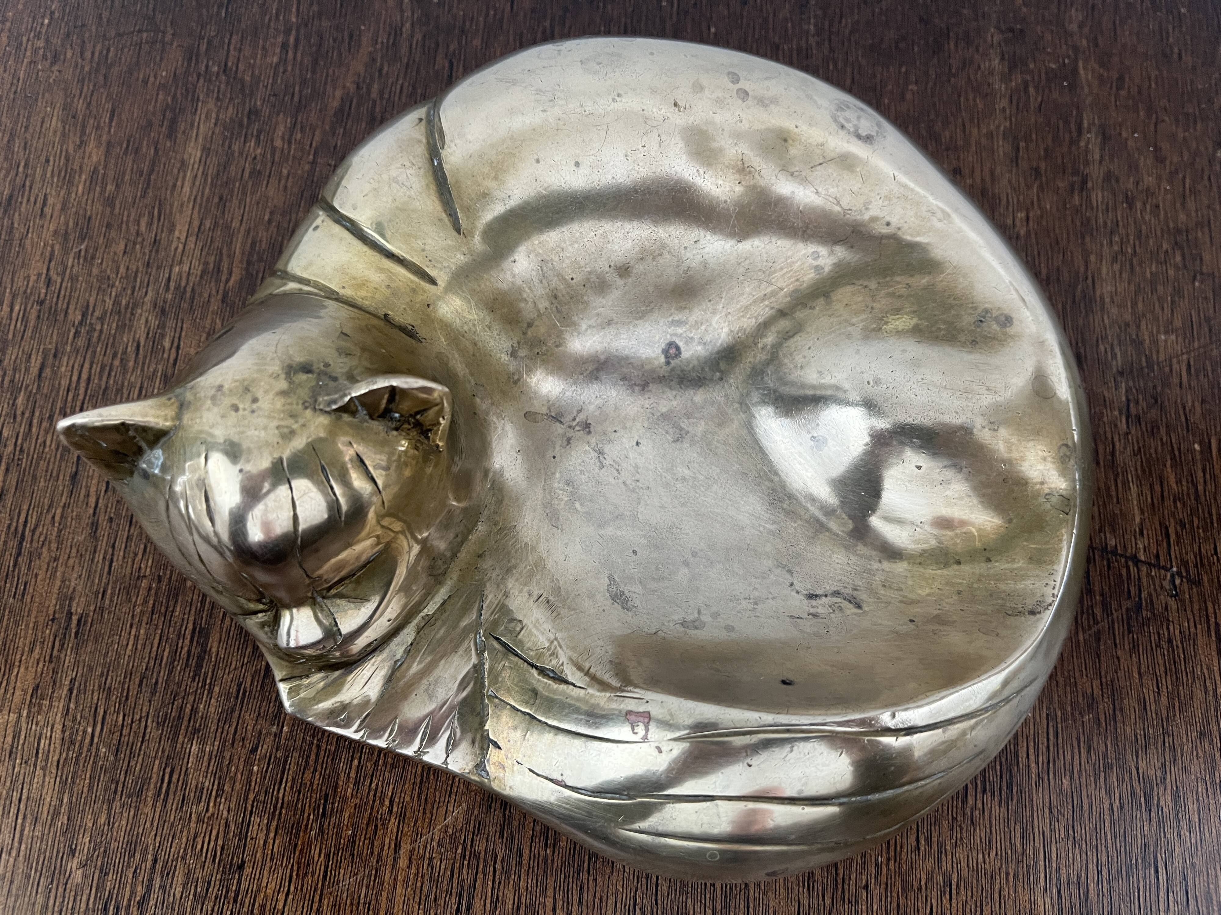 bronze cat emptier from the 1930s