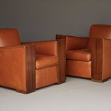 Paire de fauteuils Art Déco en cuir. Années 40.