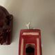 Pair of burgundy ceramic “Elephants” bookends