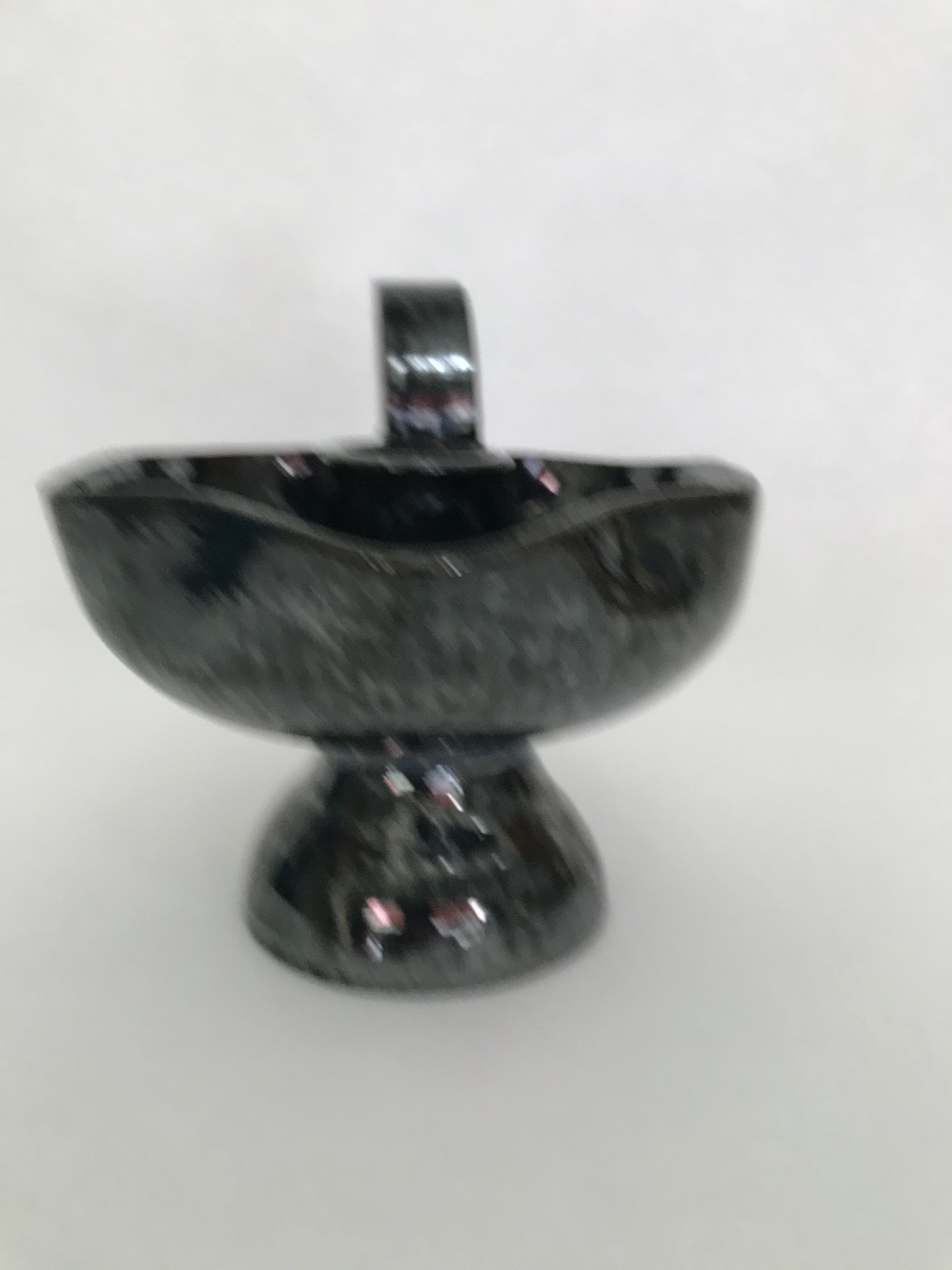 Black "hand- bougeoir with iridescents signed Fazio in Vallauris, circa 1950-1960