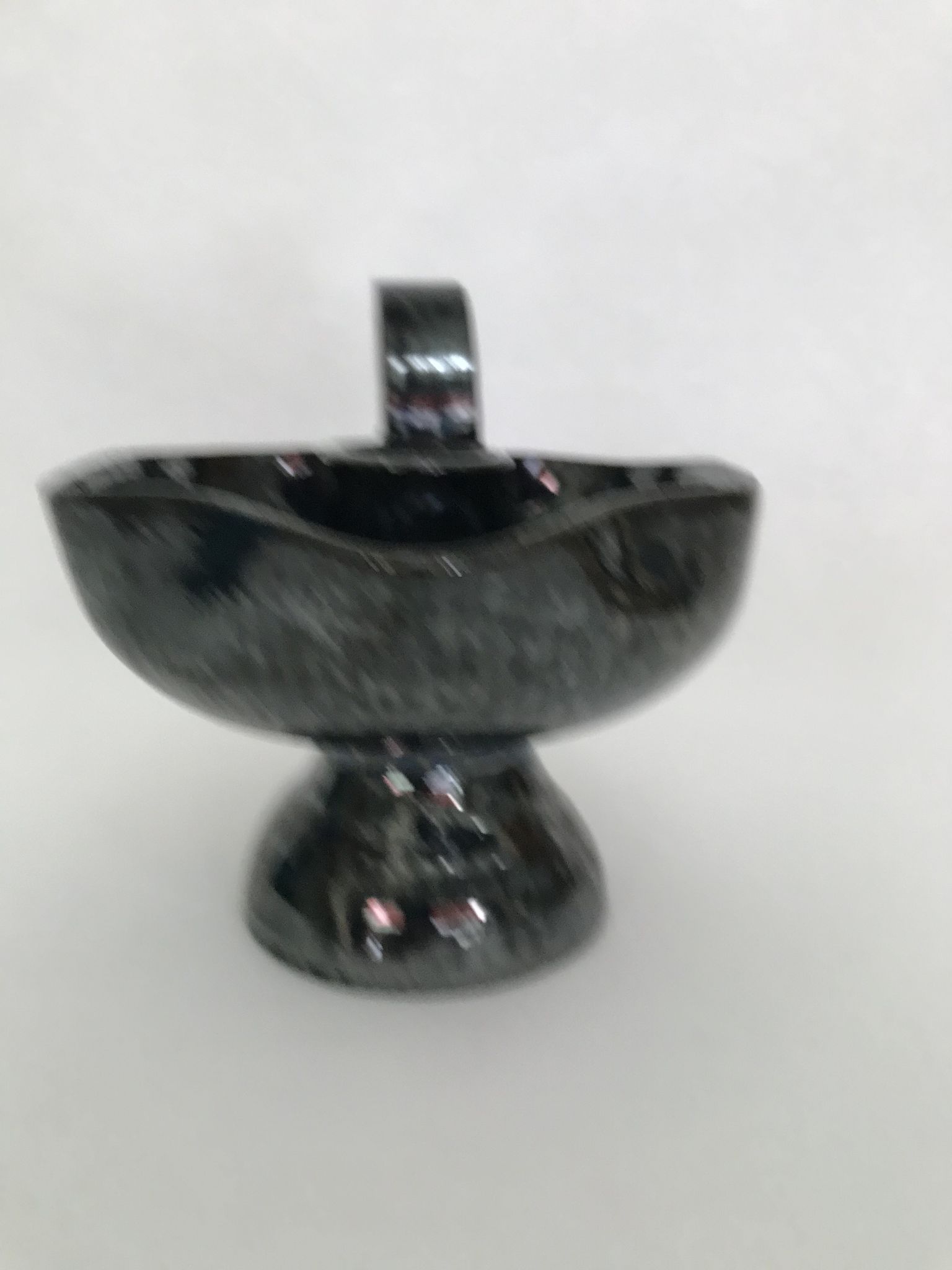 Black "hand- bougeoir with iridescents signed Fazio in Vallauris, circa 1950-1960