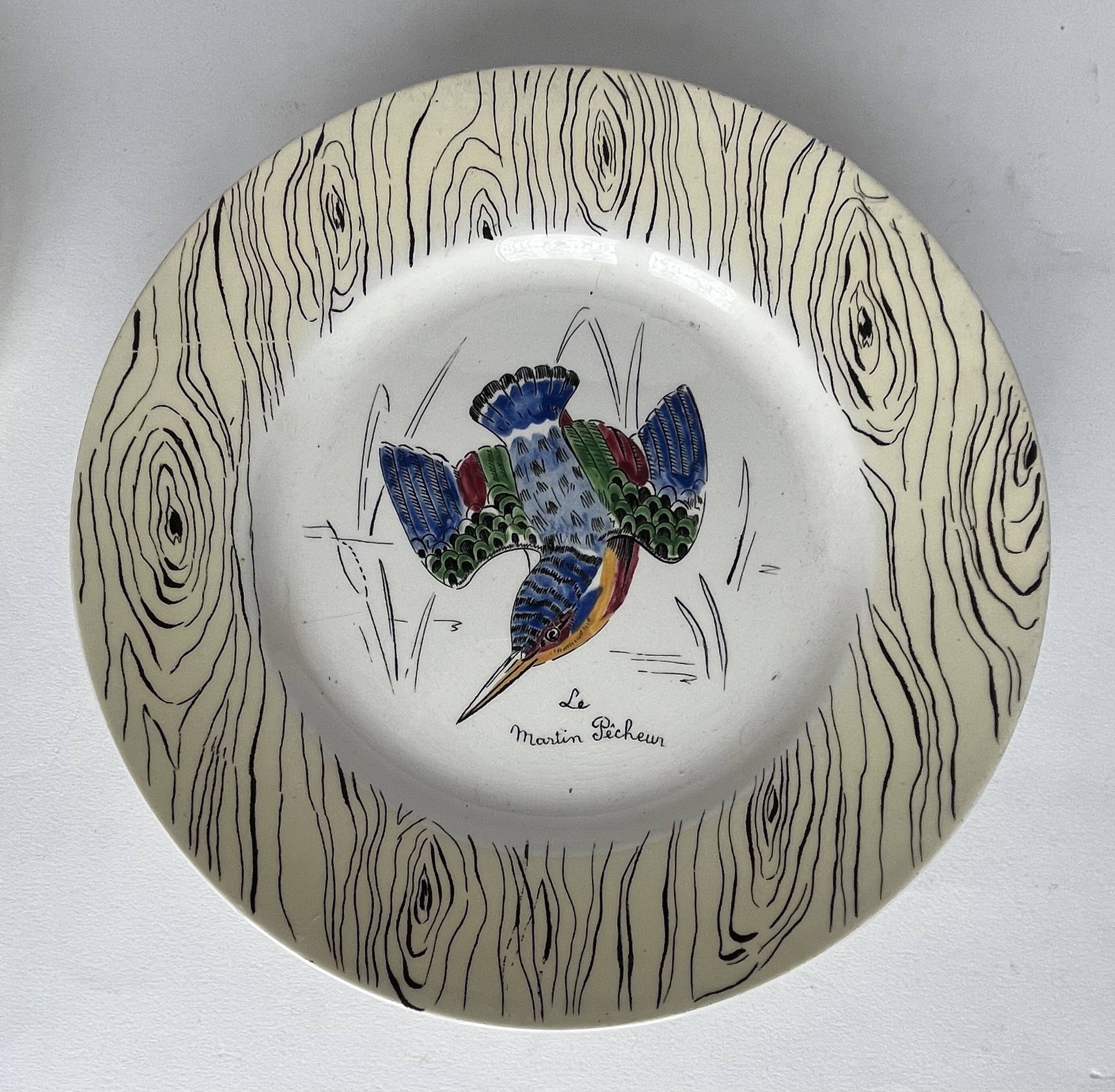 7 antique plates decorated with birds