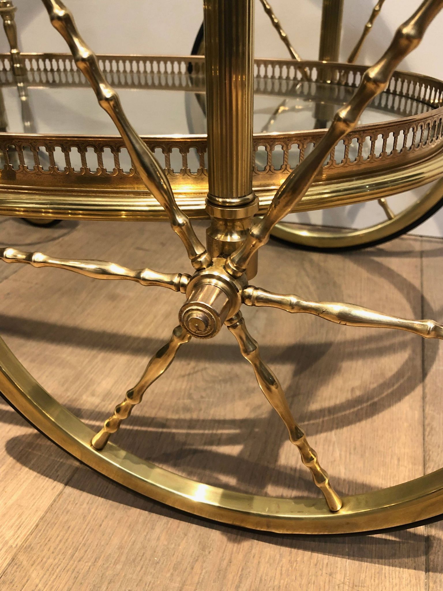 Oval brass trolley from Maison Baguès.