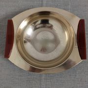 Plates and a brass and Bakelite cut by PM Italy, Italy around 1970.