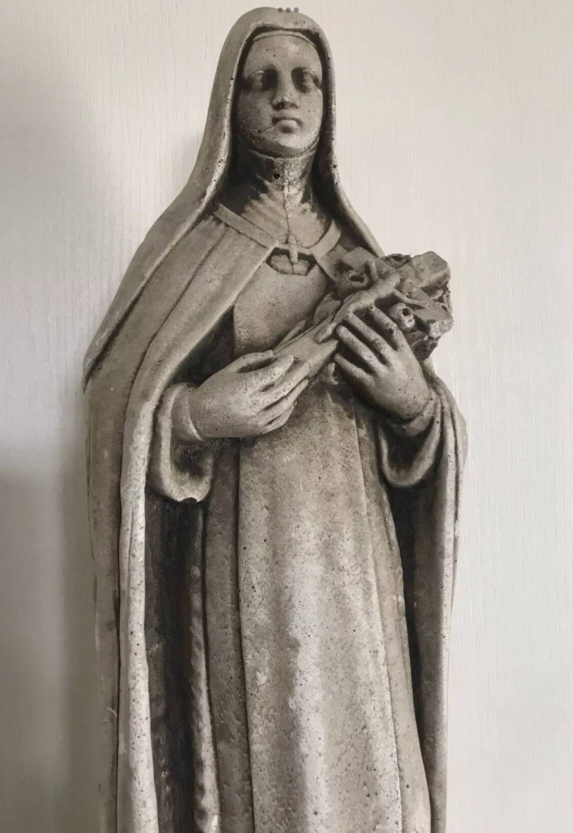 Religious statue of sainte therese of lisieux “the little flower of jesus” in stone