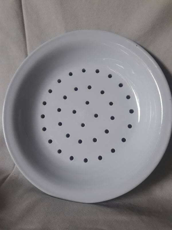 White porcelain drainer and dish