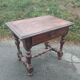 Small antique writing table in Louis XIII style made of oak.