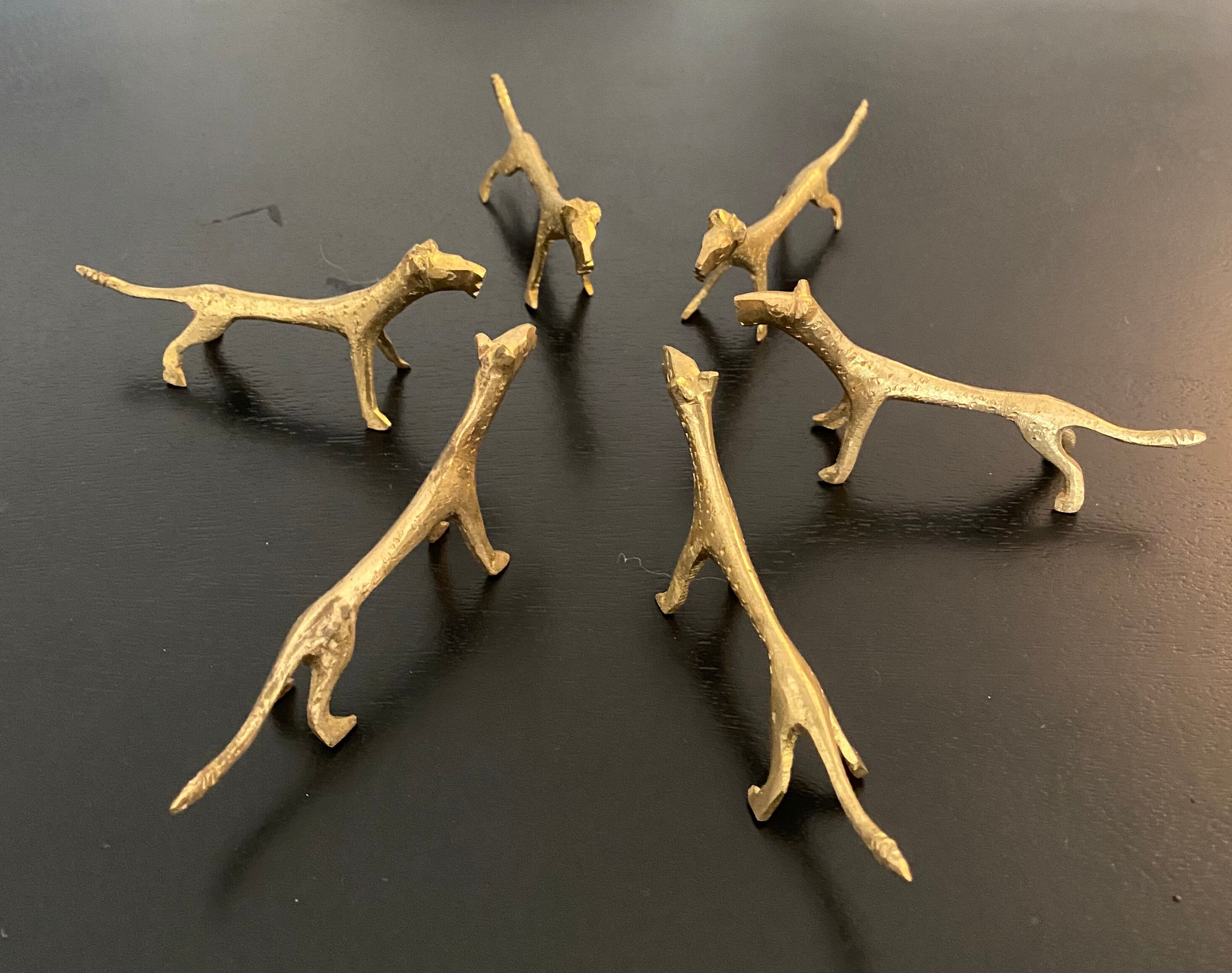 6 lioness-shaped brass knife holders