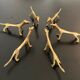 6 lioness-shaped brass knife holders