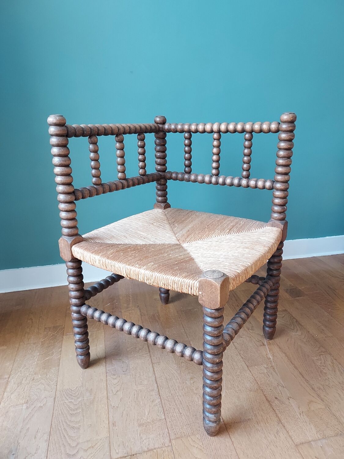 Corner armchair in turned wood