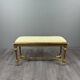 Antique gilded wooden bench in Louis XVI style, 19th century.