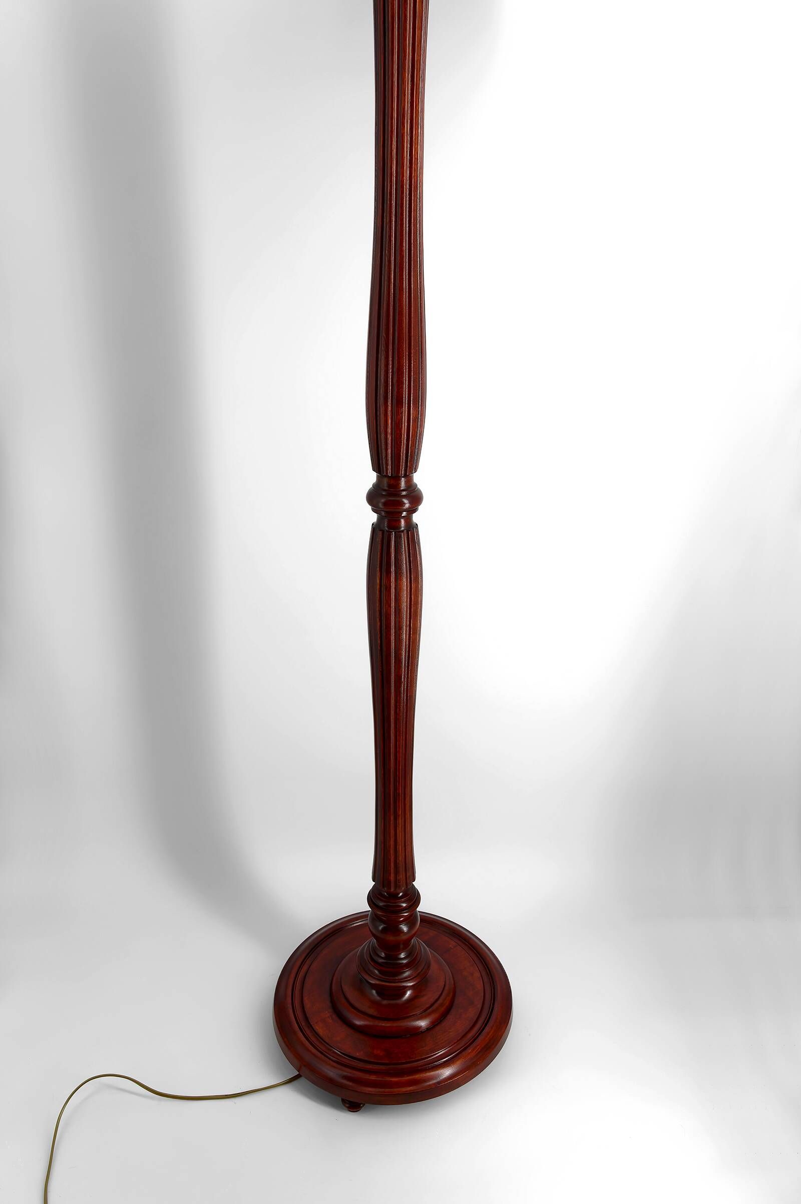 Art Deco floor lamp in carved walnut, stained glass shade, France, c. 1920