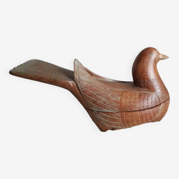 Curiosity object representing an ancient bird in carved wood
