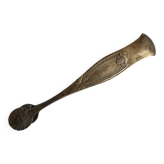 Old sugar tongs in their case