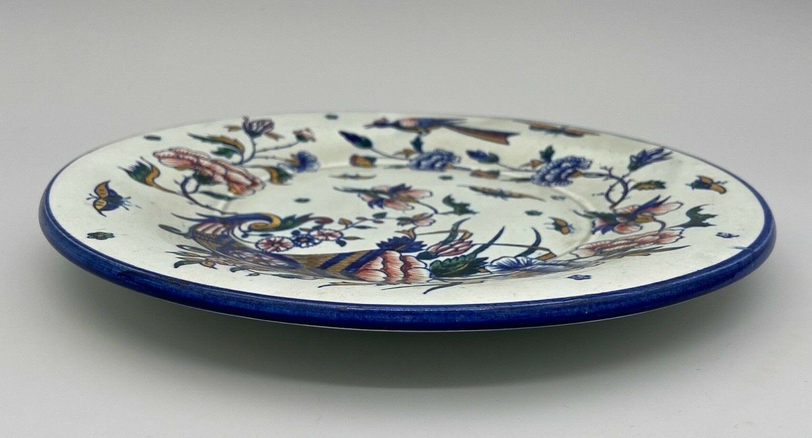 Plate gien with cornucopia decoration insect peacock butterfly