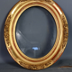 Oval frame nineteenth century gilded stucco wood and glass 36x31 foliage 28x23 cm