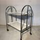 Vintage folding dessert table in chrome metal with enamelled trays.