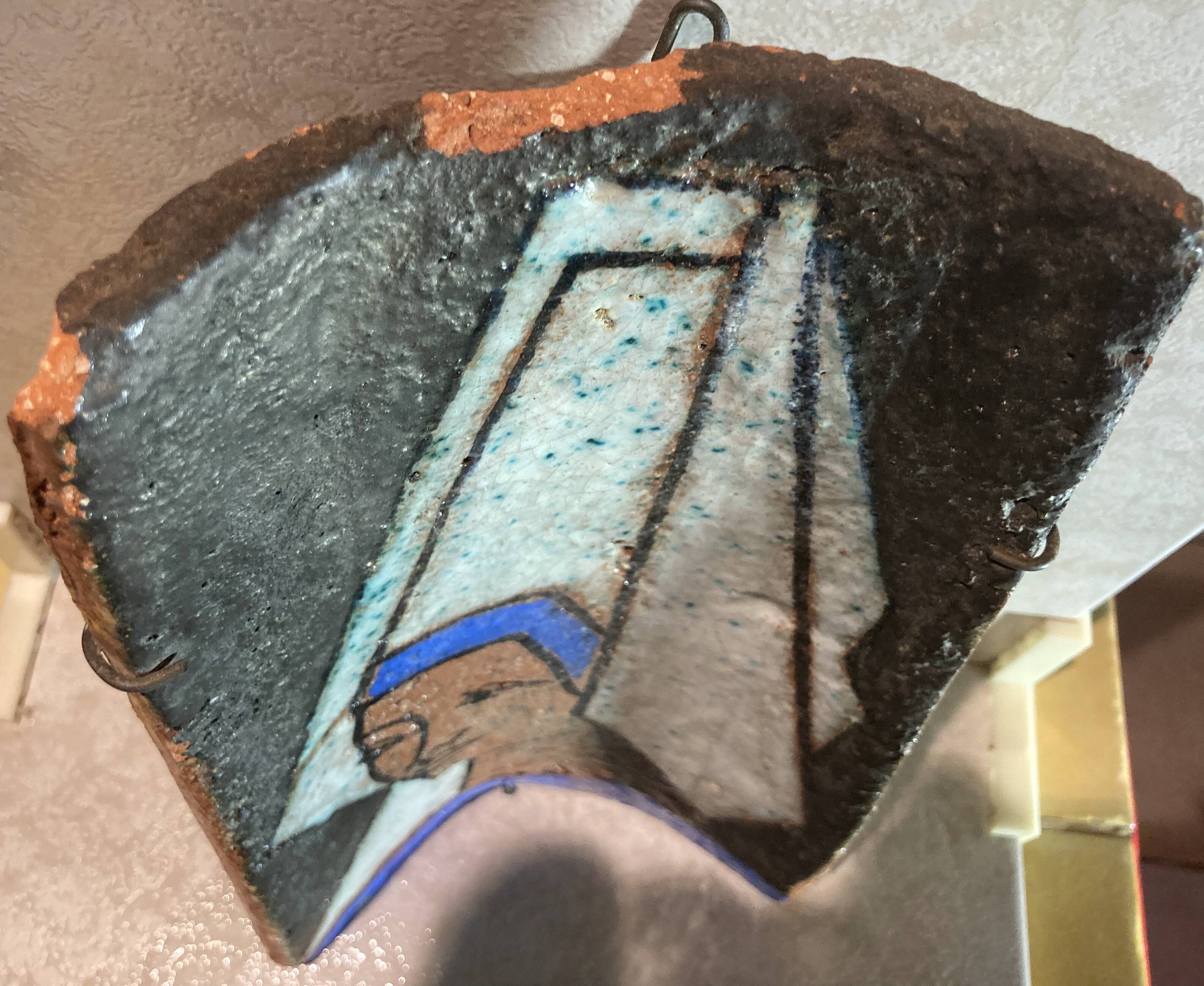 Terracotta tile with enamel decoration of a lady of the high nobility signed OGD