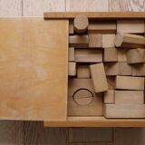 Old raw wood construction game in its cart