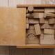 Old raw wood construction game in its cart