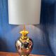 Italian design lamp in silver and gold ceramic. 1970s.